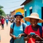 기니비사우에서 사용할 수 있는 여행 앱 추천 - A vibrant urban scene in Bissau, Guinea-Bissau, featuring a diverse group of travelers using smartph...